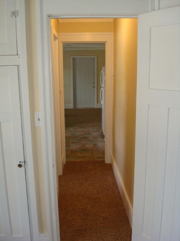 Hallway to living room from bedroom entrance